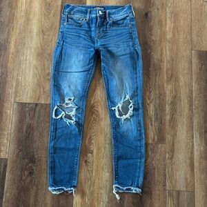 Express Distressed Mid Rise Skinny Jeans